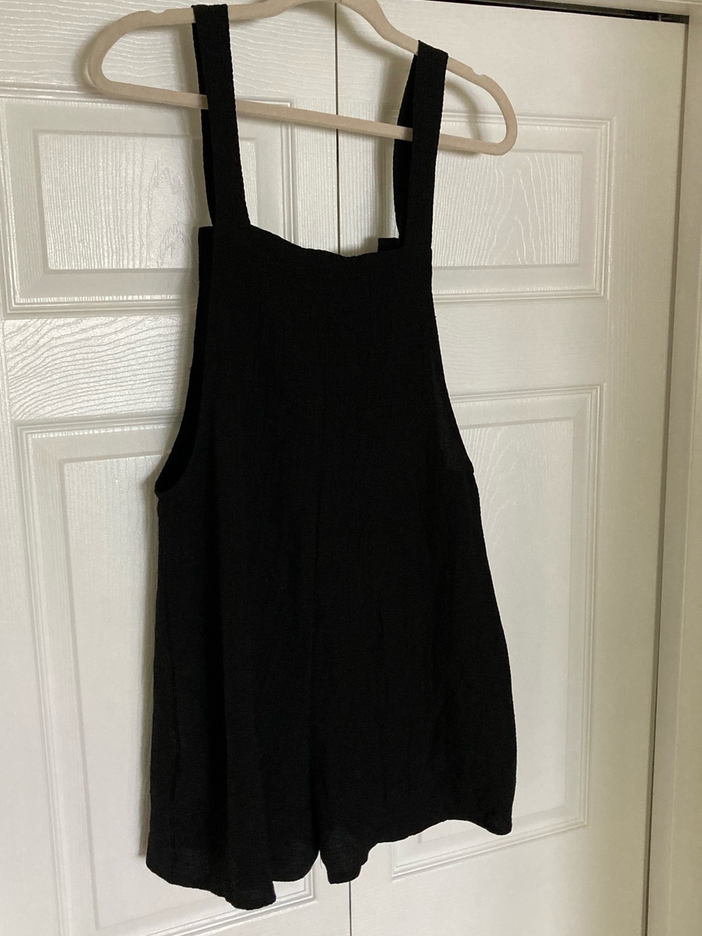 Black romper with generous pockets